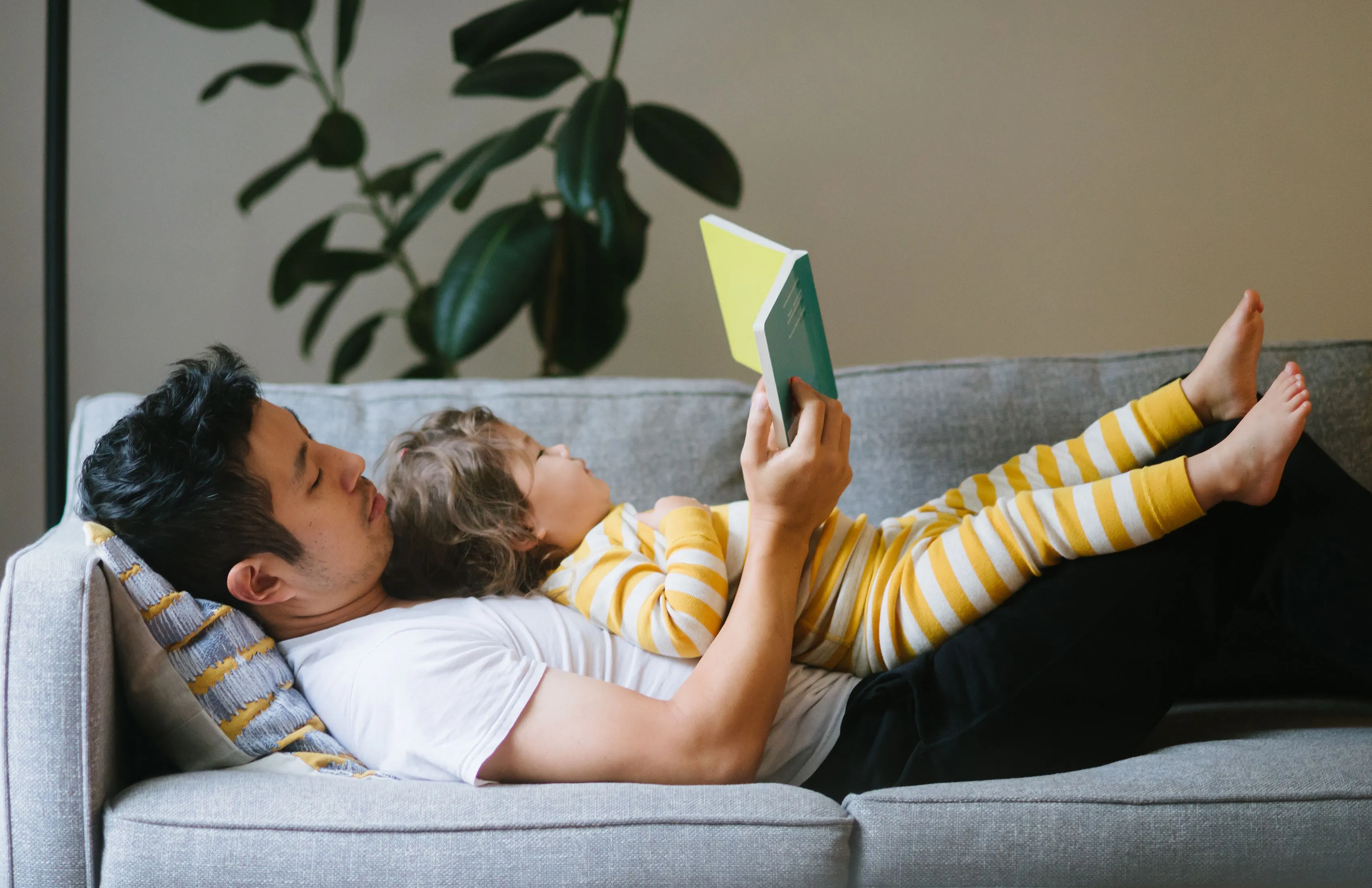 Father child reading together