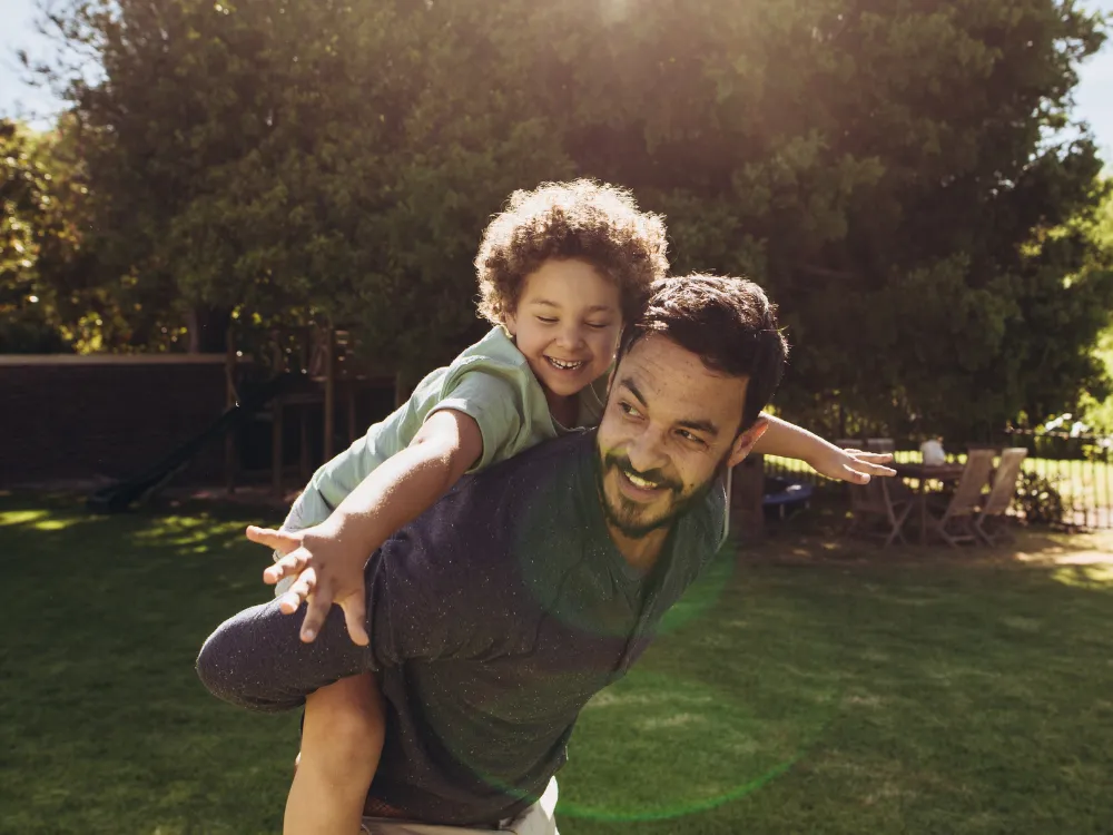 Dad and child playing